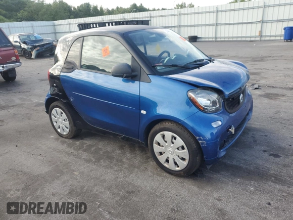 2016 Smart fortwo Passion z VIN WMEFJ5DA0GK076339, wystawiony jako Copart lot #68891564 z przebiegiem Nie podano mil oraz Szkoda całkowita • Salvage title. Historia ofert i sprzedaży dostępna na DreamBid. Obrazek 4.