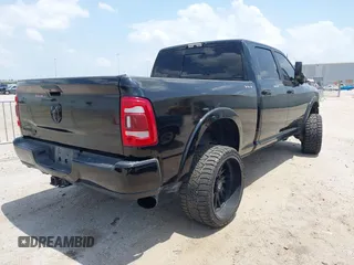 2021 Ram 2500 Laramie with VIN 3C6UR5FL7MG621346, listed as a IAAI auction lot 42419962 with 96,647 mi miles and . Bid and sale history available at DreamBid. Image 4.