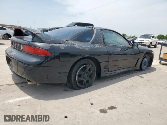 1999 Mitsubishi 3000GT z VIN JA3AM44H6XY002443, wystawiony jako Copart lot #57155505 z przebiegiem 201 588 mil mil oraz Czysty tytuł • Clean title. Historia ofert i sprzedaży dostępna na DreamBid. Obrazek 3.