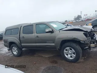 2014 Toyota Tacoma with VIN 5TFLU4EN6EX104410, listed as a IAAI auction lot 41925708 with 189,375 mi miles. Bid and sale history available at carsss.com. Image 14.