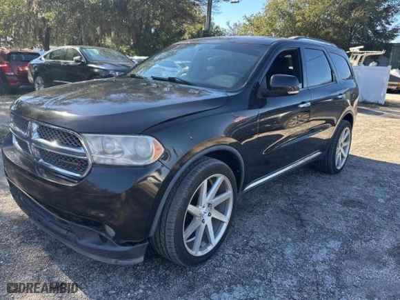 2013 Dodge Durango Crew with VIN 1C4SDHDT1DC697618, listed as a Copart auction lot 88926165 with 128,218 mi miles and Clean Title. Bid and sale history available at carsss.com. Image 2.
