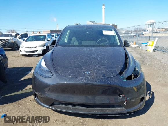 2024 Tesla Model Y Long Range with VIN 7SAYGDEE4RF149457, listed as a IAAI auction lot 41700922 with Not Provided miles. Bid and sale history available at carsss.com. Image 12.