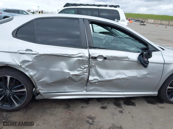 2018 Toyota Camry LE with VIN 4T1B11HK0JU129623, listed as a IAAI auction lot 41902335 with 100,643 mi miles. Bid and sale history available at carsss.com. Image 6.