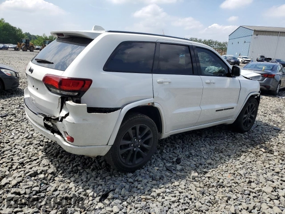 2018 Jeep Grand Cherokee Altitude with VIN 1C4RJFAGXJC122688, listed as a Copart auction lot 61290525 with 106,671 mi miles and Salvage title. Bid and sale history available at DreamBid. Image 3.