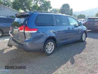 2014 Toyota Sienna XLE with VIN 5TDYK3DCXES524294, listed as a IAAI auction lot 42546467 with 122,257 mi miles and . Bid and sale history available at DreamBid. Image 4.