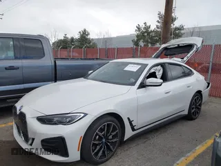 2023 BMW i4 eDrive40 z VIN WBY73AW05PFR28279, wystawiony jako IAAI lot #41262952 z przebiegiem 40 011 mil mil oraz . Historia ofert i sprzedaży dostępna na DreamBid. Obrazek 23.
