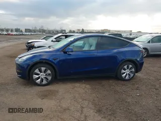 2023 Tesla Model Y Long Range with VIN 7SAYGDEE6PF947827, listed as a IAAI auction lot 41443524 with 12,381 mi miles and . Bid and sale history available at DreamBid. Image 14.