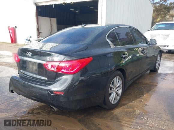 2014 Infiniti Q50 with VIN JN1BV7AP8EM675841, listed as a IAAI auction lot 41582924 with 139,637 mi miles. Bid and sale history available at carsss.com. Image 4.