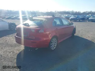 2010 Mitsubishi Lancer GTS with VIN JA32X8HW7AU019939, listed as a IAAI auction lot 41702699 with 96,623 mi miles. Bid and sale history available at carsss.com. Image 4.
