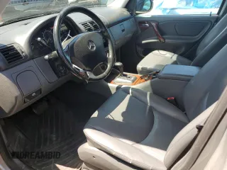 1999 Mercedes-Benz M 320/430/500 with VIN 4JGAB54E7XA078616, listed as a Copart auction lot 55301695 with 137,918 mi miles and Salvage title. Bid and sale history available at DreamBid. Image 7.