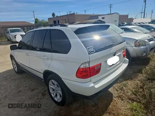 2006 BMW X5 4.4i with VIN 5UXFB53556LV26283, listed as a Copart auction lot 79714584 with 77,033 mi miles and Clean Title. Bid and sale history available at carsss.com. Image 3.