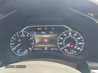 2016 Nissan Murano SL z VIN 5N1AZ2MHXGN116160, wystawiony jako IAAI lot #42241458 z przebiegiem 161 727 mil mil oraz . Historia ofert i sprzedaży dostępna na DreamBid. Obrazek 7.