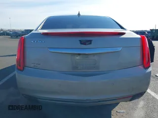 2013 Cadillac XTS Luxury z VIN 2G61R5S31D9185009, wystawiony jako IAAI lot #41243001 z przebiegiem 161 219 mil mil oraz . Historia ofert i sprzedaży dostępna na DreamBid. Obrazek 16.