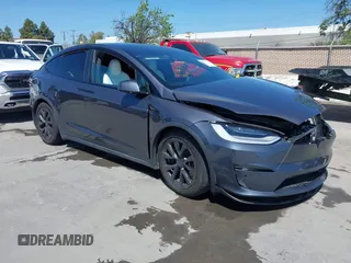2022 Tesla Model X with VIN 7SAXCAE59NF360301, listed as a IAAI auction lot 41945059 with Not Provided miles and . Bid and sale history available at DreamBid. Image 1.
