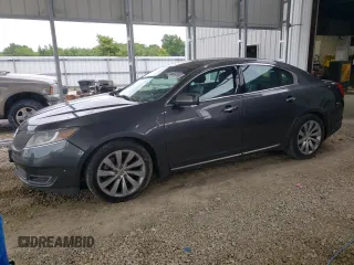 2016 Lincoln MKS z VIN 1LNHL9DK9GG601740, wystawiony jako Copart lot #60557565 z przebiegiem 89 350 mil mil oraz Szkoda całkowita • Salvage title. Historia ofert i sprzedaży dostępna na DreamBid. Obrazek 1.