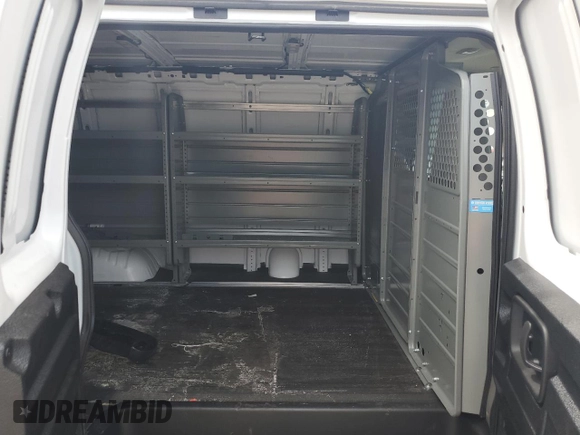 2023 GMC Savana Cargo z VIN 1GTW7AFP7P1111956, wystawiony jako Copart lot #69986504 z przebiegiem 11 645 mil mil oraz Szkoda całkowita • Salvage title. Historia ofert i sprzedaży dostępna na DreamBid. Obrazek 11.