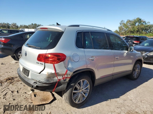 2012 Volkswagen Tiguan SE z VIN WVGAV7AX9CW531219, wystawiony jako Copart lot #81881644 z przebiegiem 125 695 mil mil oraz Szkoda całkowita • Salvage title. Historia ofert i sprzedaży dostępna na DreamBid. Obrazek 3.