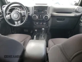 2013 Jeep Wrangler Unlimited Sport z VIN 1C4HJWDG2DL698061, wystawiony jako Copart lot #57823945 z przebiegiem 144 558 mil mil oraz Czysty tytuł • Clean title. Historia ofert i sprzedaży dostępna na DreamBid. Obrazek 8.