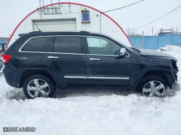 2011 Jeep Grand Cherokee Overland with VIN 1J4RR6GT5BC604784, listed as a IAAI auction lot 41515626 with 66,654 mi miles. Bid and sale history available at carsss.com. Image 14.