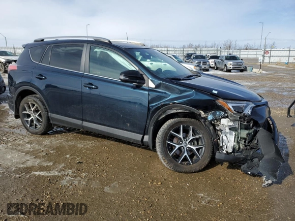 2018 Toyota RAV4 SE with VIN 2T3JFREV3JW806407, listed as a Copart auction lot 48980005 with 70,165 mi miles and Salvage title. Bid and sale history available at DreamBid. Image 4.