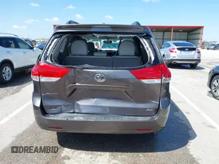 2012 Toyota Sienna XLE AAS with VIN 5TDYK3DC8CS263406, listed as a IAAI auction lot 41971770 with 186,394 mi miles. Bid and sale history available at carsss.com. Image 16.