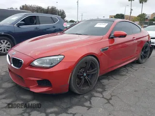 2013 BMW M6 z VIN WBSLX9C55DC968497, wystawiony jako IAAI lot #41863884 z przebiegiem 128 241 mil mil oraz . Historia ofert i sprzedaży dostępna na DreamBid. Obrazek 18.