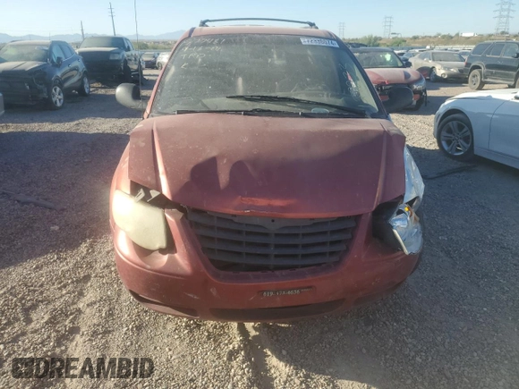 2007 Chrysler Town & Country Touring z VIN 2A8GP54L37R127233, wystawiony jako Copart lot #72338074 z przebiegiem Nie podano mil oraz Szkoda całkowita • Salvage title. Historia ofert i sprzedaży dostępna na DreamBid. Obrazek 5.
