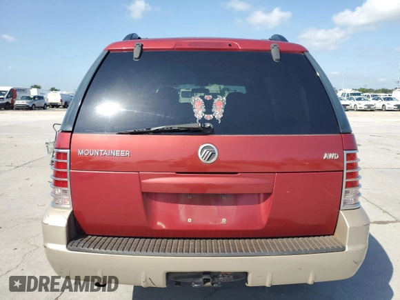2005 Mercury Mountaineer Convenience with VIN 4M2ZU86K35UJ11915, listed as a Copart auction lot 61972765 with 129,775 mi miles and Salvage title. Bid and sale history available at DreamBid. Image 6.