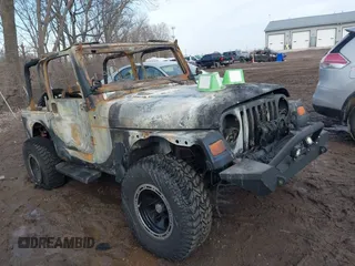 2003 Jeep Wrangler Sport with VIN 1J4FA49S93P374406, listed as a IAAI auction lot 41648982 with Not provided miles and . Bid and sale history available at DreamBid. Image 12.