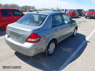 2010 Nissan Versa 1.8 S with VIN 3N1BC1AP1AL419287, listed as a IAAI auction lot 41861949 with 102,232 mi miles. Bid and sale history available at carsss.com. Image 4.