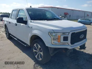 2020 Ford F-150 XL with VIN 1FTEW1E51LKD56934, listed as a IAAI auction lot 42186291 with 249,586 mi miles. Bid and sale history available at carsss.com. Image 1.