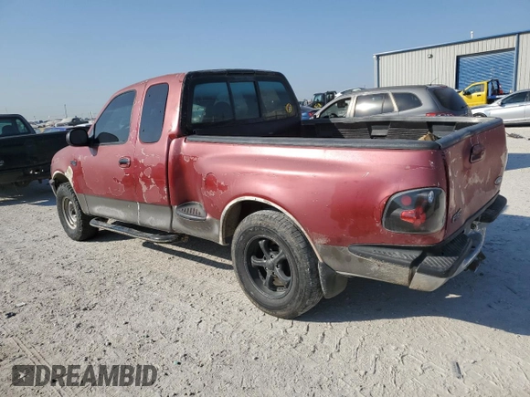 1997 Ford F-150 XL with VIN 1FTDX0721VKC14947, listed as a Copart auction lot 74887414 with 157,811 mi miles and Salvage title. Bid and sale history available at DreamBid. Image 2.