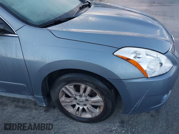 2010 Nissan Altima S with VIN 1N4AL2AP0AN512628, listed as a IAAI auction lot 42102865 with 184,235 mi miles and . Bid and sale history available at DreamBid. Image 14.