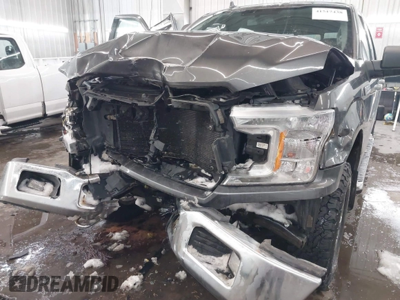 2018 Ford F-150 XL with VIN 1FTEW1E53JKF58493, listed as a IAAI auction lot 41517438 with 159,483 mi miles. Bid and sale history available at carsss.com. Image 6.
