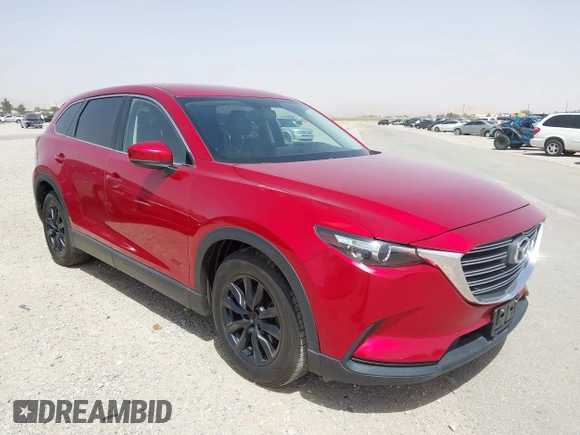 2016 Mazda CX-9 Touring z VIN JM3TCACY9G0102524, wystawiony jako IAAI lot #42305452 z przebiegiem 76 892 mil mil oraz . Historia ofert i sprzedaży dostępna na DreamBid. Obrazek 6.