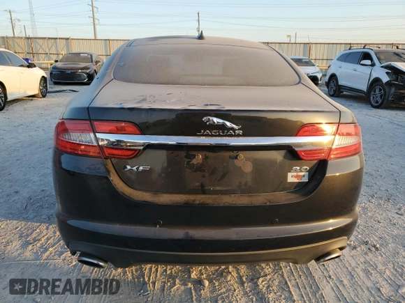 2015 Jaguar XF V6 Portfolio with VIN SAJWA0F76F8U59802, listed as a Copart auction lot 77198104 with 98,859 mi miles and Clean Title. Bid and sale history available at carsss.com. Image 6.