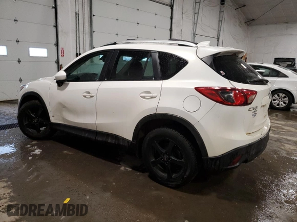2014 Mazda CX-5 Grand Touring with VIN JM3KE4DY9E0343616, listed as a Copart auction lot 46427715 with 205,325 mi miles and Salvage Title. Bid and sale history available at carsss.com. Image 2.