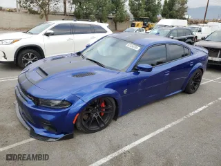 2022 Dodge Charger SRT Hellcat Widebody with VIN 2C3CDXL90NH210965, listed as a Copart auction lot 82330704 with 7,239 mi miles and Salvage Title. Bid and sale history available at carsss.com. Image 1.