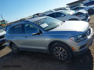 2020 Volkswagen Tiguan SE with VIN 3VV2B7AX4LM081188, listed as a IAAI auction lot 41655478 with 63,593 mi miles. Bid and sale history available at carsss.com. Image 13.