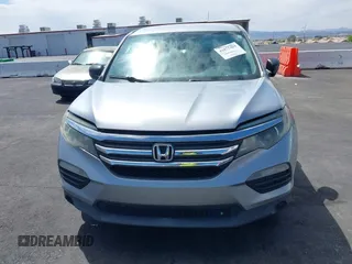 2016 Honda Pilot LX with VIN 5FNYF5H10GB044006, listed as a IAAI auction lot 42075404 with 129,642 mi miles and . Bid and sale history available at DreamBid. Image 6.