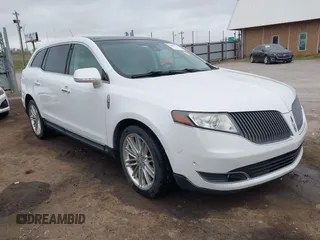 2014 Lincoln MKT EcoBoost with VIN 2LMHJ5AT0EBL50661, listed as a IAAI auction lot 41898237 with 118,770 mi miles and . Bid and sale history available at DreamBid. Image 1.