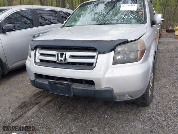 2006 Honda Pilot EX-L with RES with VIN 5FNYF286X6B043597, listed as a IAAI auction lot 41940460 with 325,118 mi miles. Bid and sale history available at carsss.com. Image 6.