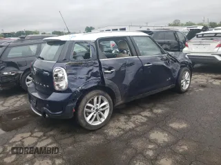 2014 MINI Countryman S с VIN WMWZC5C5XEWP36643, выставлен на аукционе Copart как лот 60142695 с пробегом 116 497 миль миль и Списание • Salvage title. История ставок и продаж доступна на DreamBid. Изображение 3.
