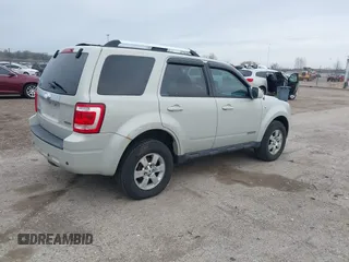 2008 Ford Escape Limited with VIN 1FMCU94108KB33023, listed as a IAAI auction lot 41956715 with 144,421 mi miles. Bid and sale history available at carsss.com. Image 4.