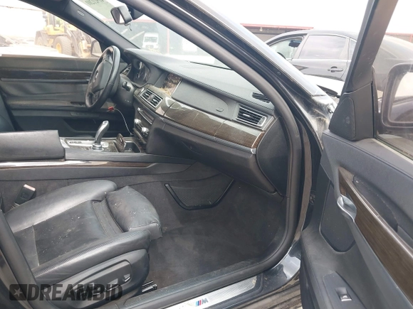 2013 BMW 7 Series 750i with VIN WBAYA8C59DC996552, listed as a IAAI auction lot 41921201 with 99,188 mi miles and . Bid and sale history available at DreamBid. Image 5.