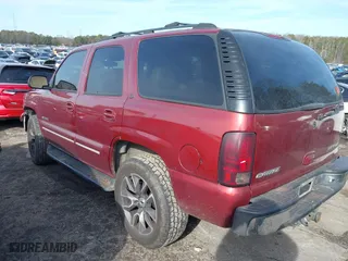 2003 Chevrolet Tahoe LT with VIN 1GNEC13ZX3R307650, listed as a IAAI auction lot 41292769 with 313,720 mi miles. Bid and sale history available at carsss.com. Image 3.