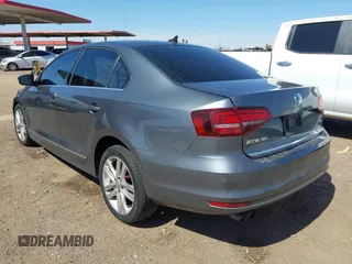 2017 Volkswagen Jetta SEL z VIN 3VWL17AJ6HM407708, wystawiony jako IAAI lot #41848360 z przebiegiem Nie podano mil oraz . Historia ofert i sprzedaży dostępna na DreamBid. Obrazek 3.