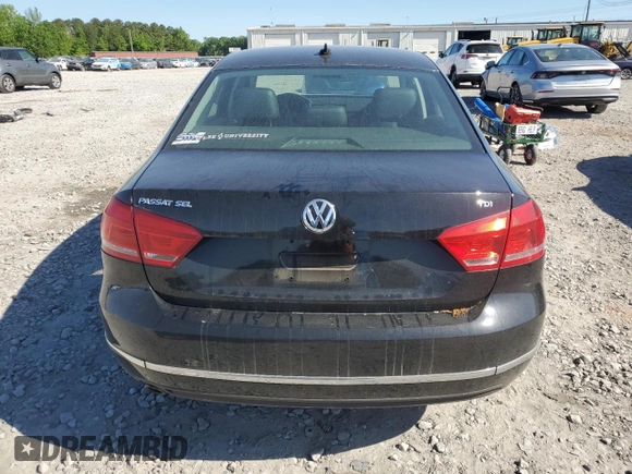 2013 Volkswagen Passat SEL Premium z VIN 1VWCN7A38DC030199, wystawiony jako Copart lot #53314795 z przebiegiem 125 617 mil mil oraz Szkoda całkowita • Salvage title. Historia ofert i sprzedaży dostępna na DreamBid. Obrazek 6.