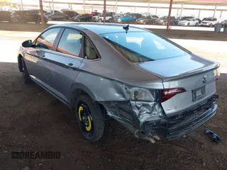 2021 Volkswagen Jetta S with VIN 3VWC57BU4MM100299, listed as a IAAI auction lot 42567409 with 38,013 mi miles and . Bid and sale history available at DreamBid. Image 3.