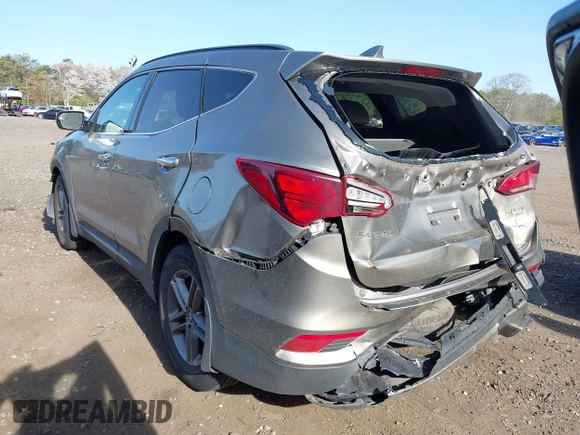 2018 Hyundai Santa Fe 2.4L z VIN 5NMZUDLB7JH077241, wystawiony jako IAAI lot #42135854 z przebiegiem 59 819 mil mil oraz . Historia ofert i sprzedaży dostępna na DreamBid. Obrazek 3.